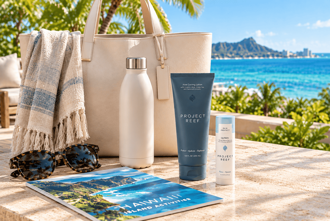 A flat-lay of assorted premium corporate giveaway items including Project Reef sunscreen, a reusable bottle, and an activity guide.