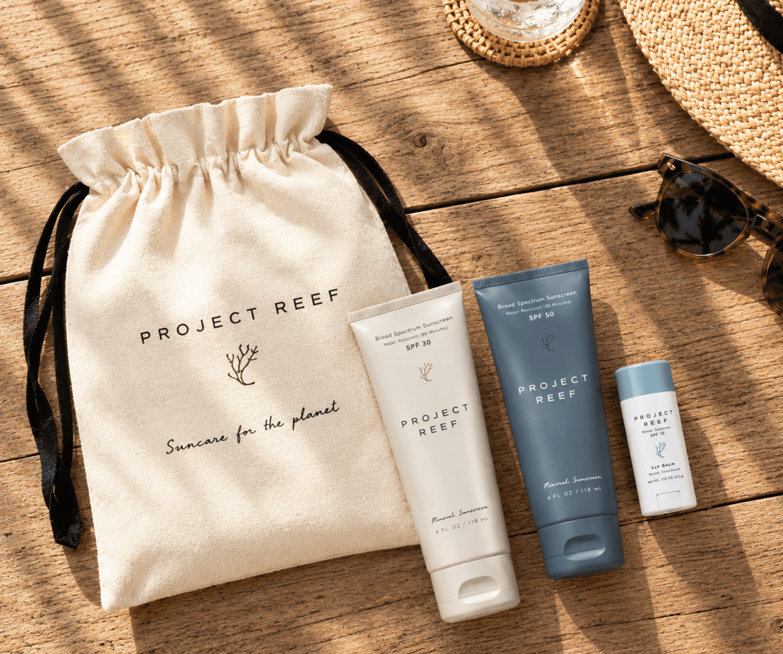 A neatly arranged corporate retreat gifts by Project Reef with mineral sunscreen products.