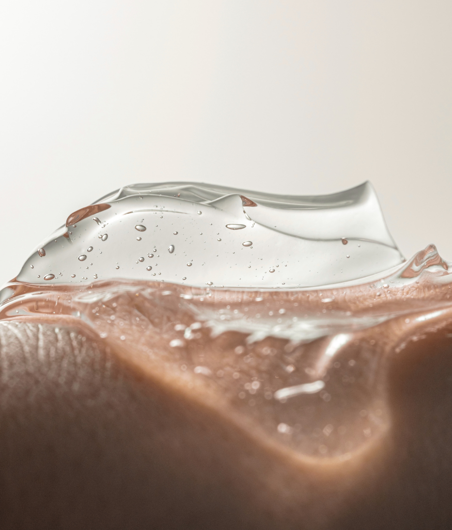 Close-up of a aloe gel sun care product being applied to skin