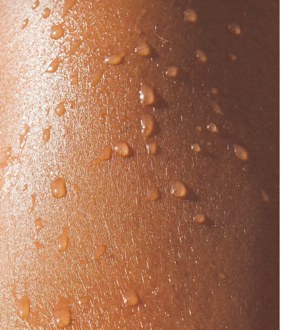 Close-up of skin texture with after sun cooling lotion.