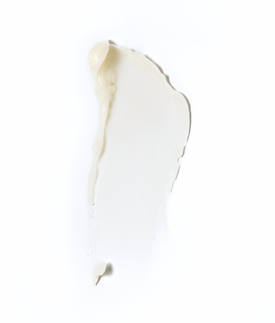White mineral sunscreen cream swatch.