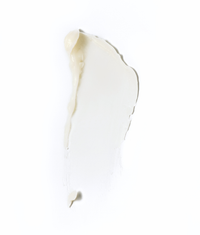 White mineral sunscreen cream swatch.