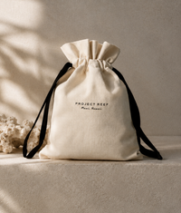 Project Reef beige drawstring bag for reef safe sunscreen products