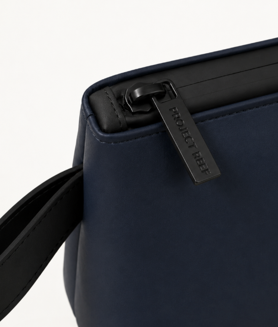 Navy blue Project Reef pouch for sunscreen products